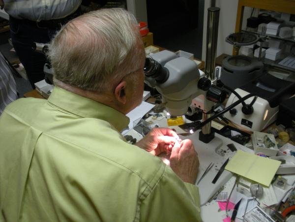 Bill Pinch using his microscope.jpg