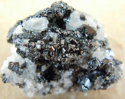 Kalahari manganese fields bixbyite crystals on calcite crystal cluster-south africa.jpg