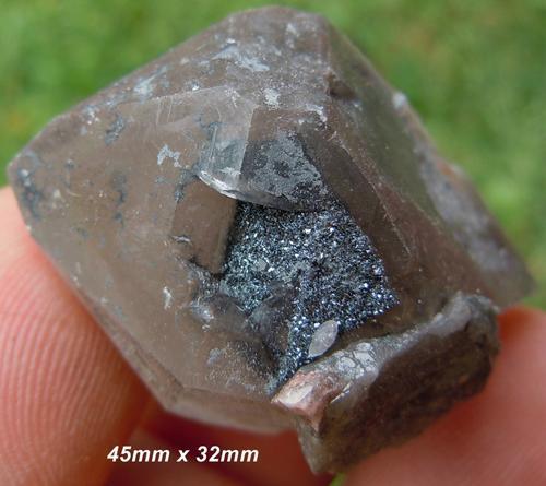 Messina 5 shaft hematite crystals on hematite included quartz crystal-south africa.jpg